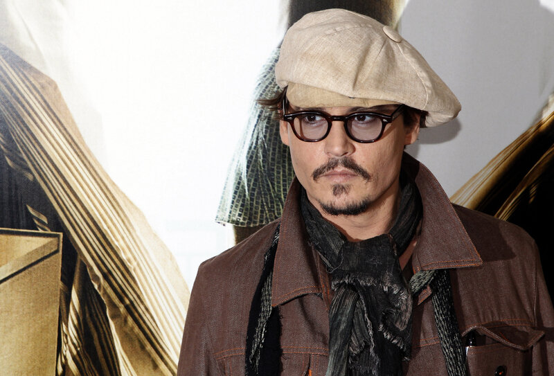 Man Wearing Hat and Glasses — Brown