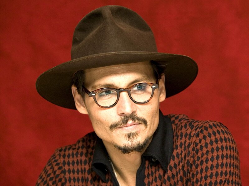 Man Wearing Hat and Glasses — Red, Serious
