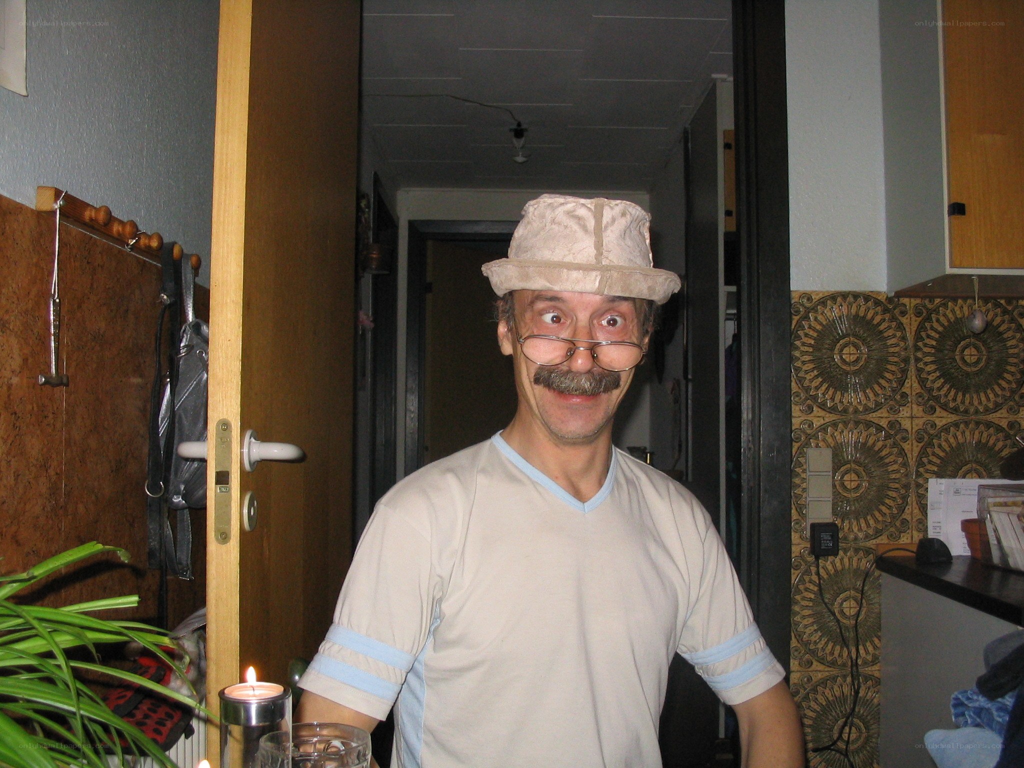 man wearing hat and glasses