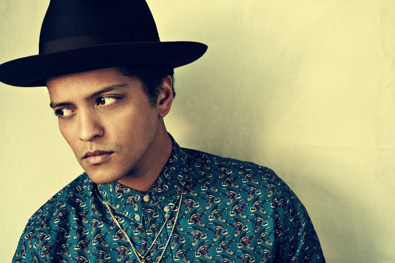Man Wearing Hat and Patterned Shirt