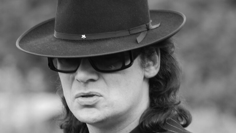 Man Wearing Hat and Sunglasses — Black, Serious