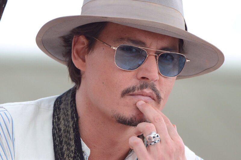 Man Wearing Hat and Sunglasses — Gray, Contemplative