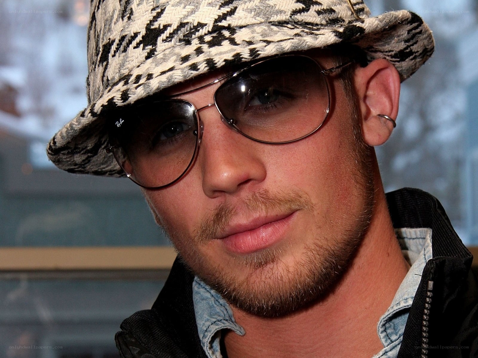 man wearing hat and sunglasses