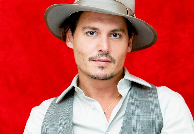 Man Wearing Hat and Vest — Red