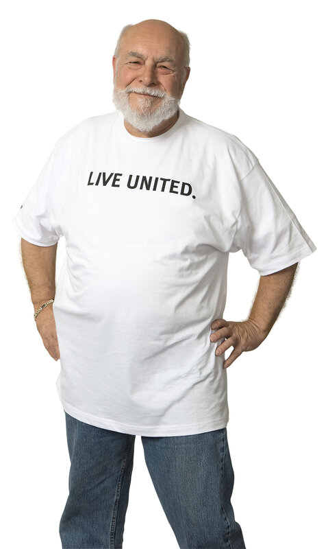 man wearing live united t-shirt