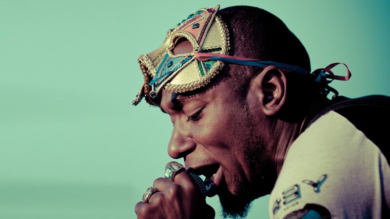 Man Wearing Mask Singing