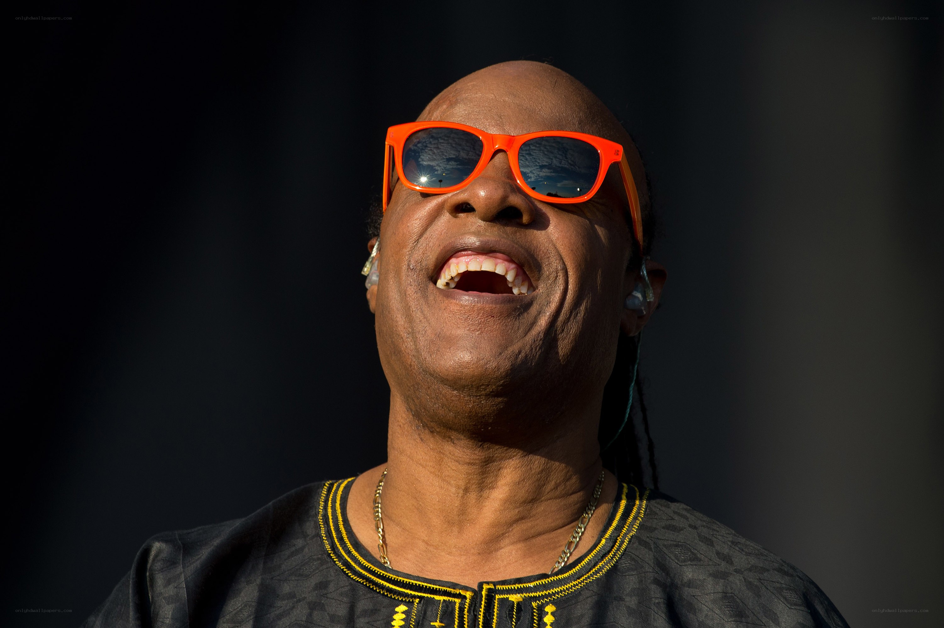 man wearing orange sunglasses