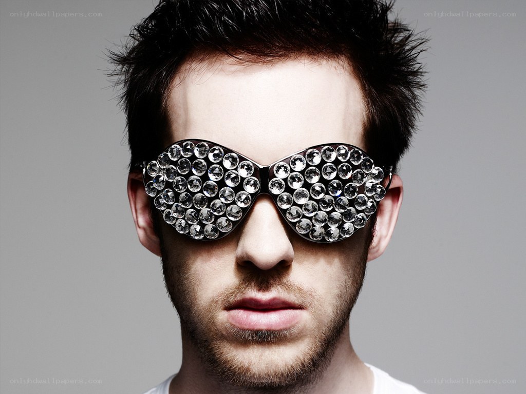man wearing rhinestone sunglasses