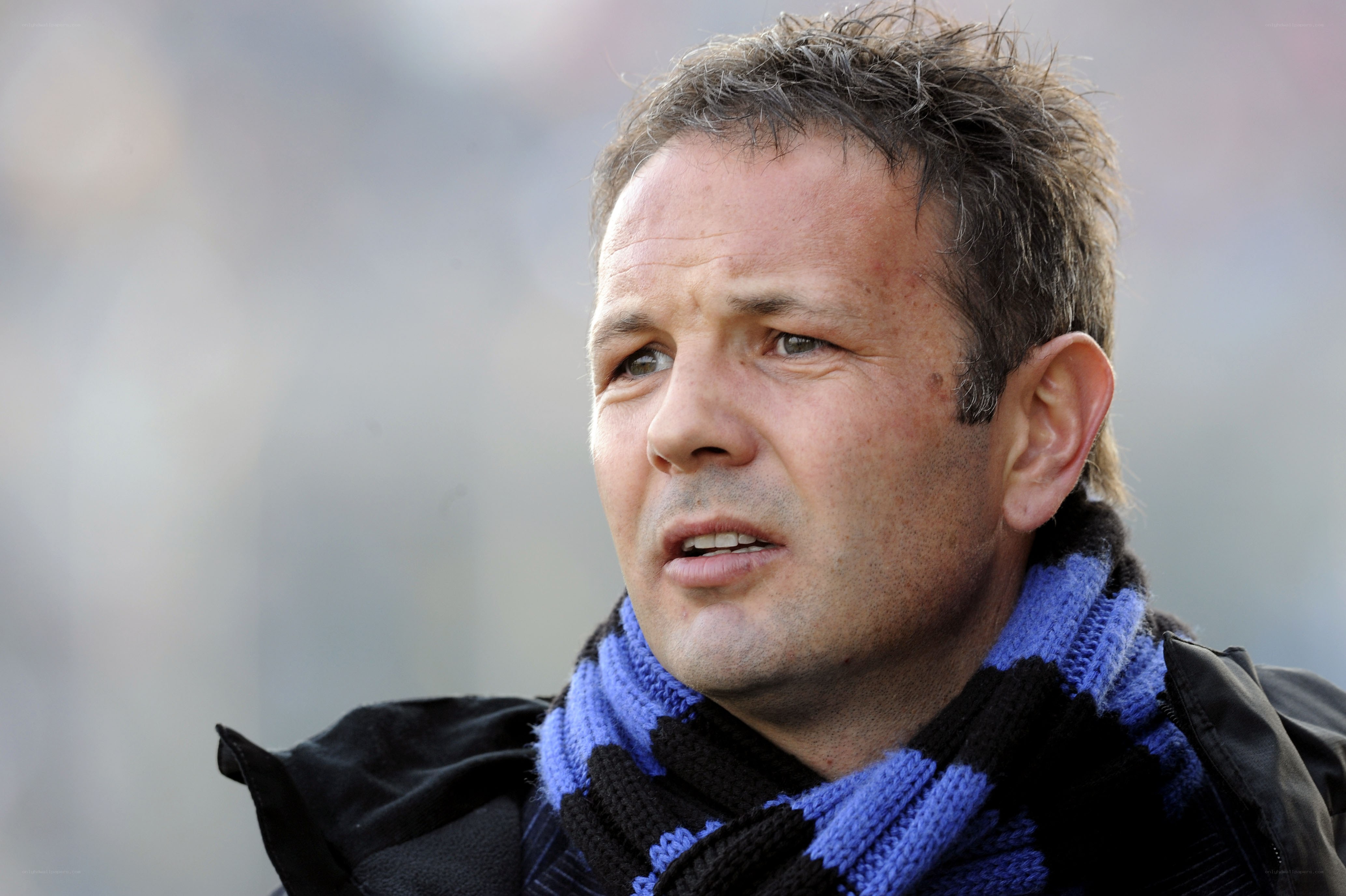 man wearing scarf outdoors