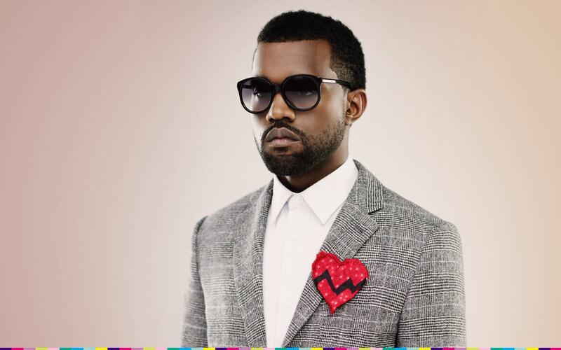 Man Wearing Suit and Sunglasses