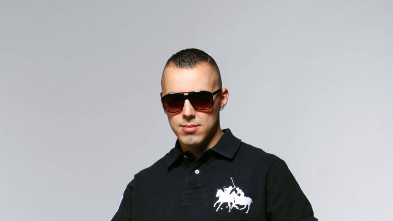 man wearing sunglasses and polo shirt