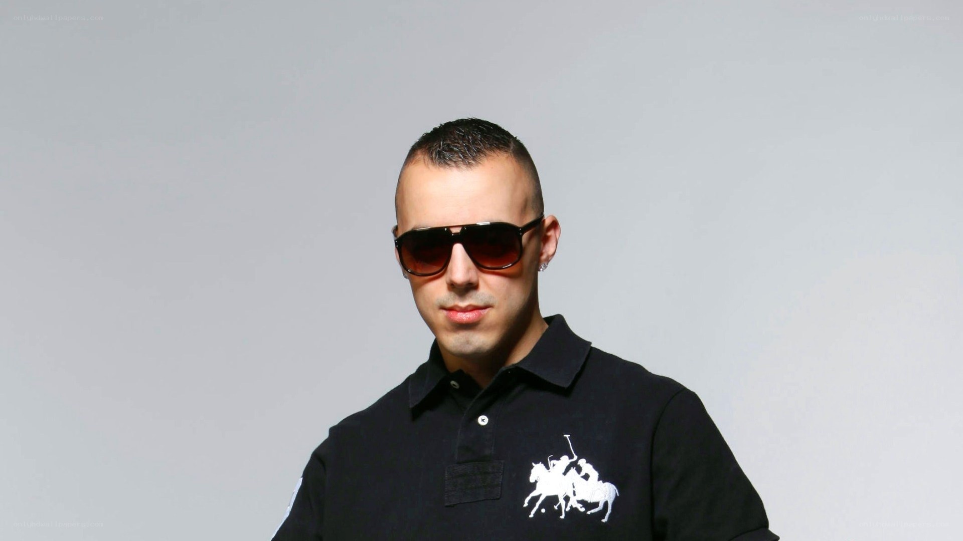 man wearing sunglasses and polo shirt