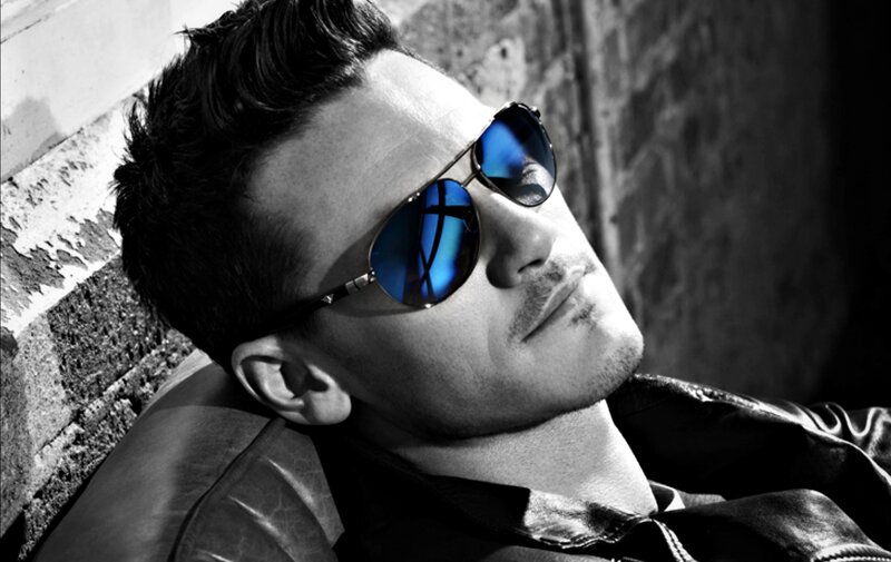 Man Wearing Sunglasses — Black, Dramatic, Photograph, Leather Jacket, Brick Wall