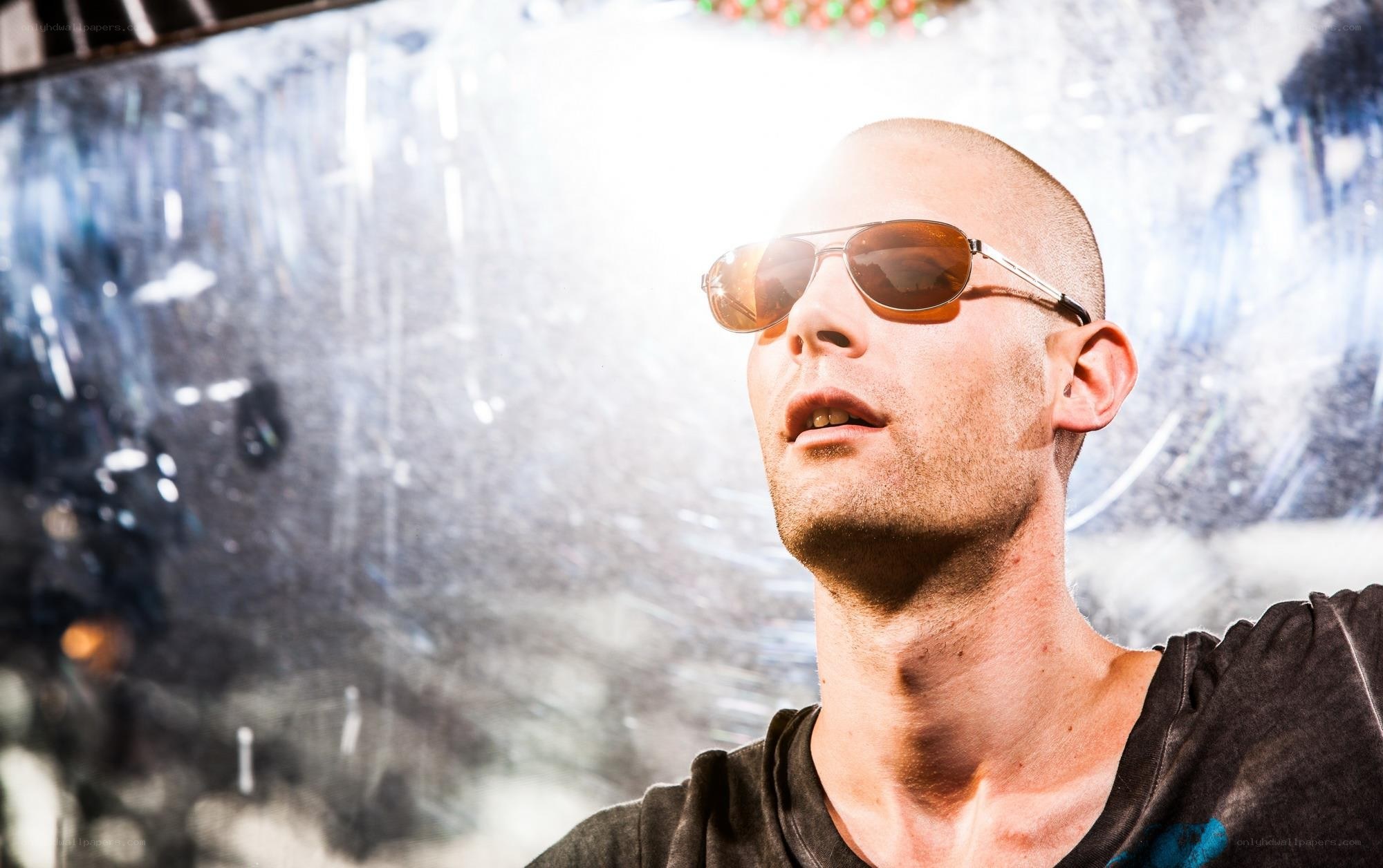 man wearing sunglasses in bright light
