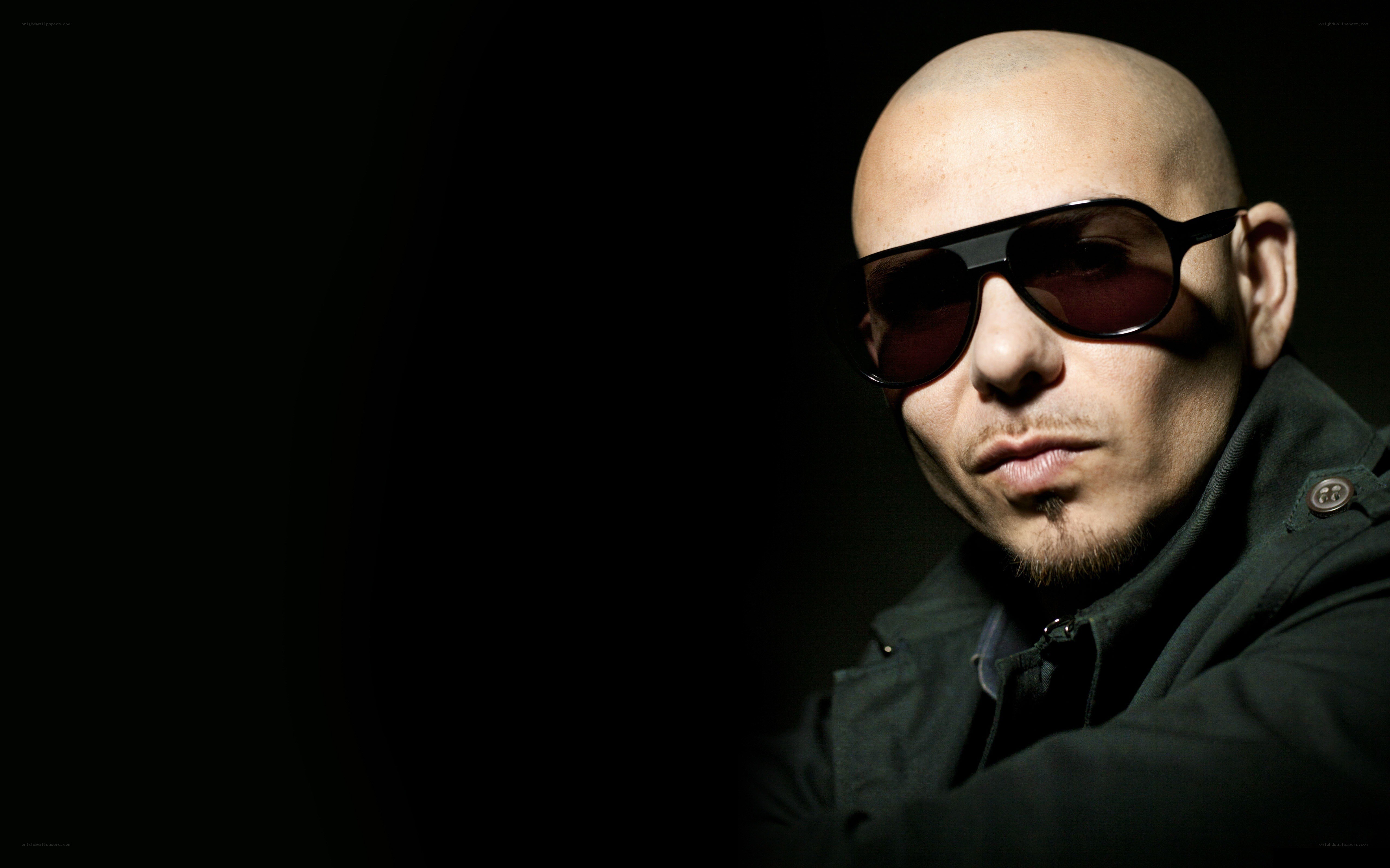man wearing sunglasses in dark setting