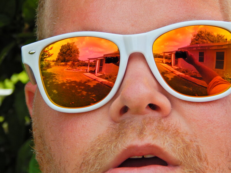Man Wearing Sunglasses — Orange, Dramatic