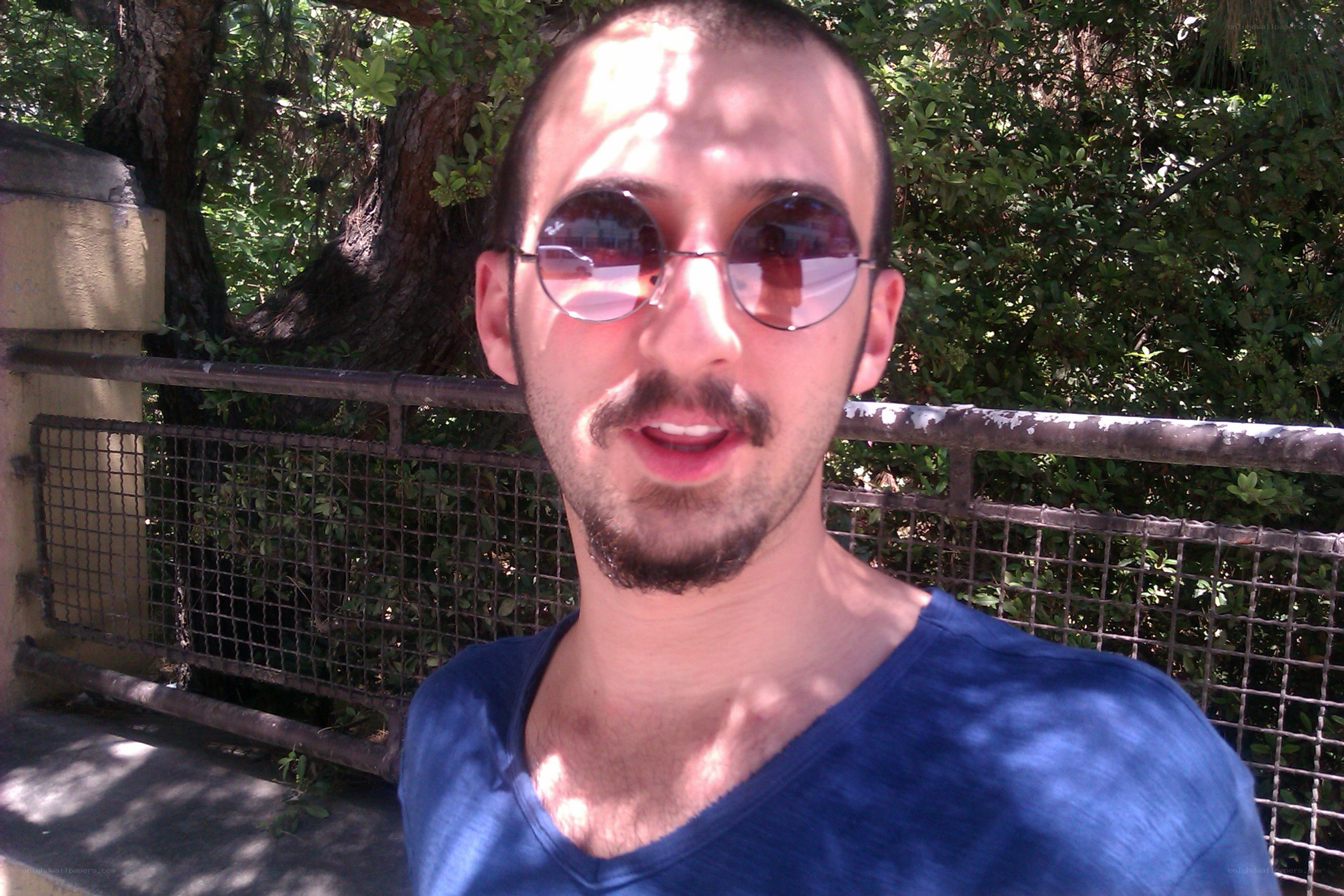 man wearing sunglasses outdoors