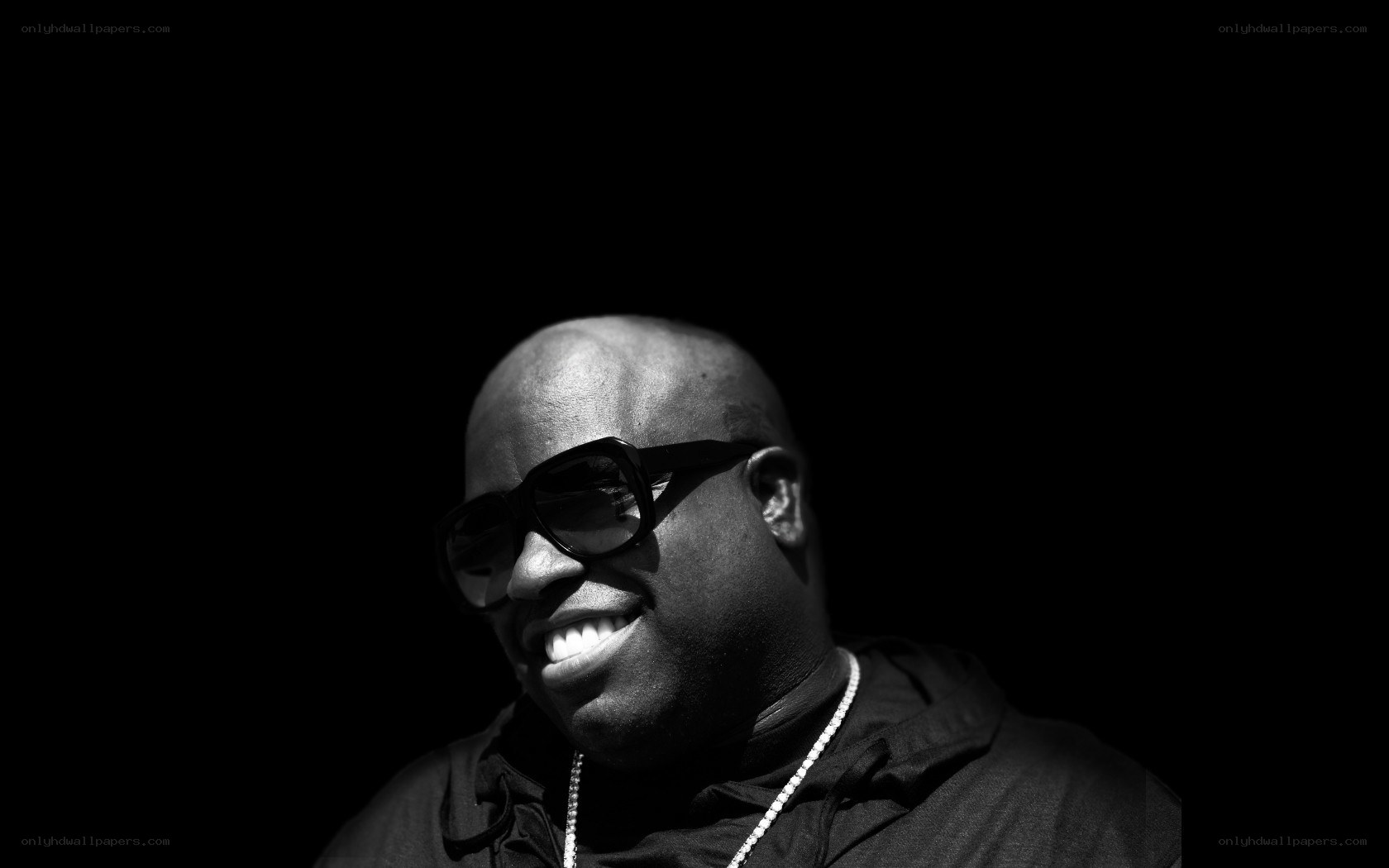 man wearing sunglasses smiling