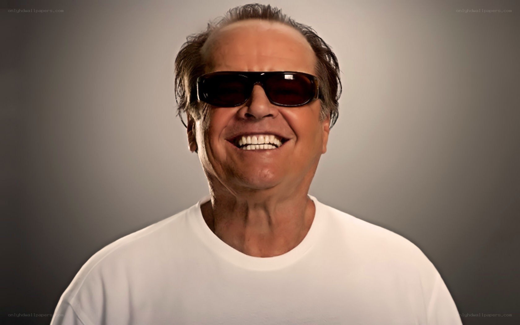 man wearing sunglasses smiling