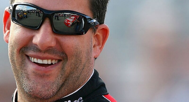 man wearing sunglasses smiling