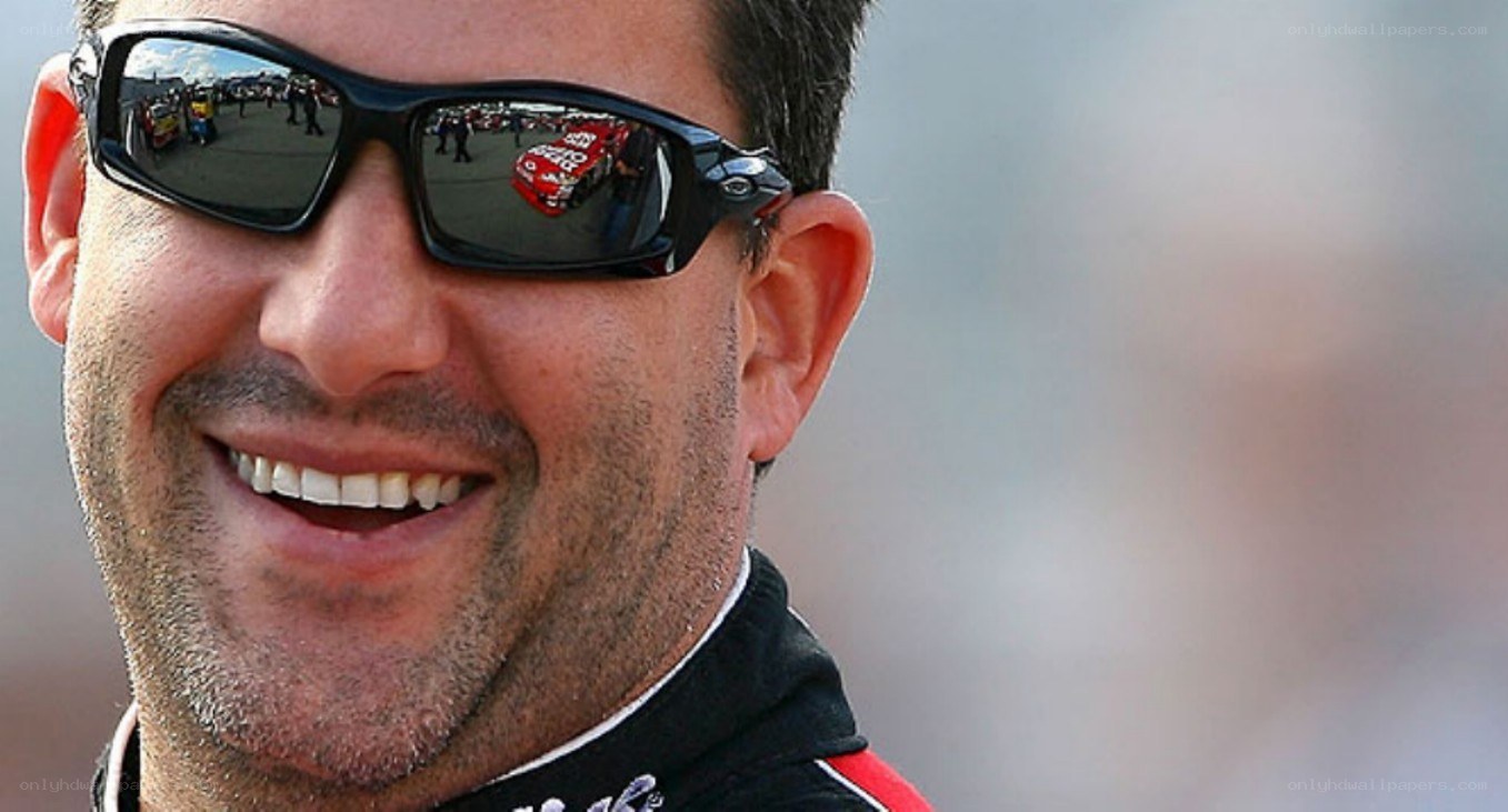 man wearing sunglasses smiling
