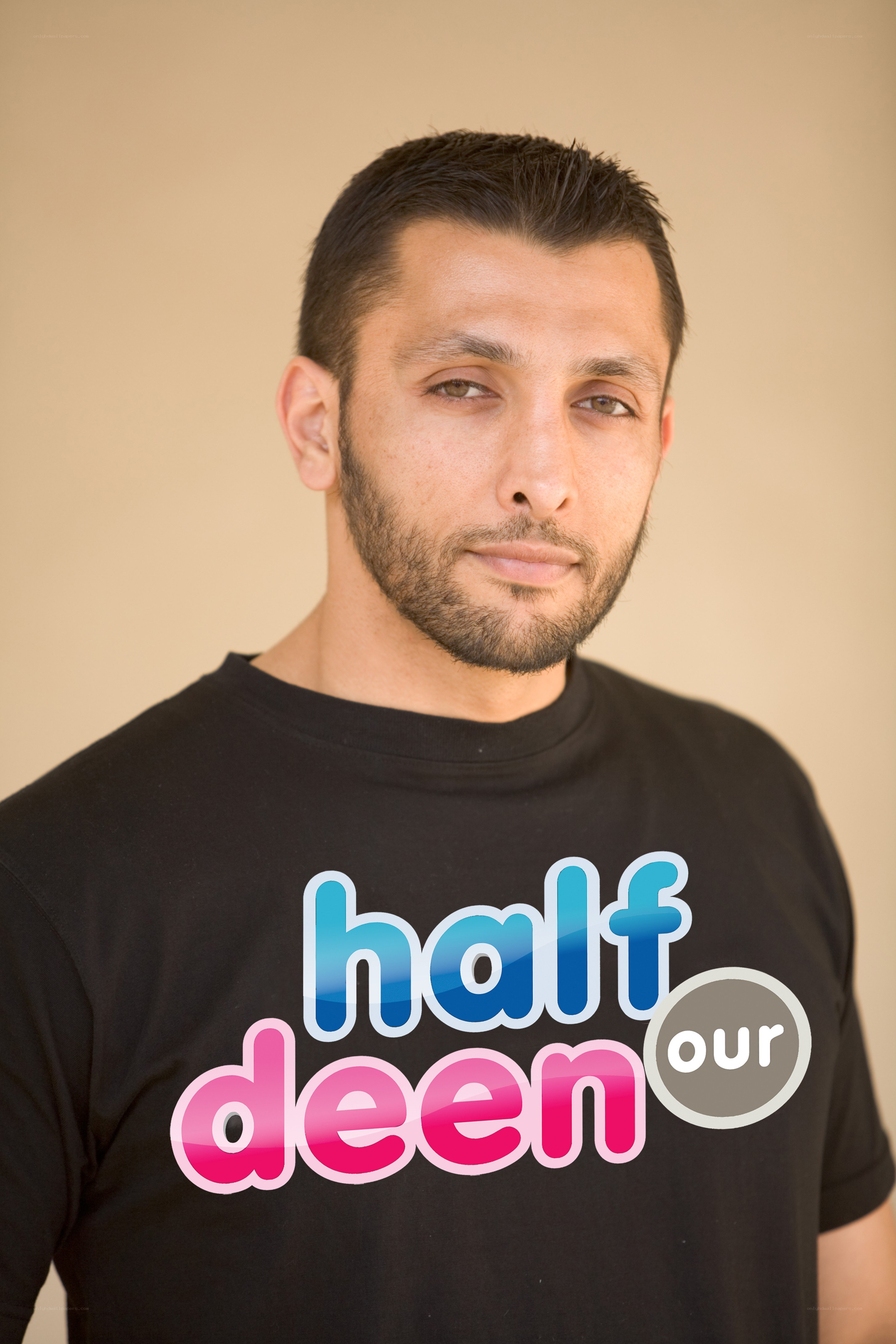 man wearing t-shirt with text