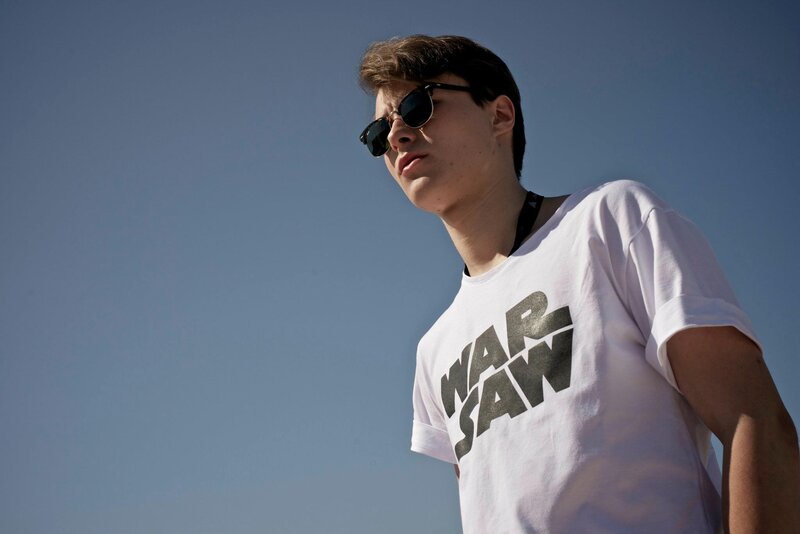 man wearing war saw t-shirt