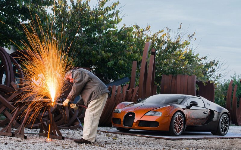 Man Welding Near Car — Orange, Dramatic