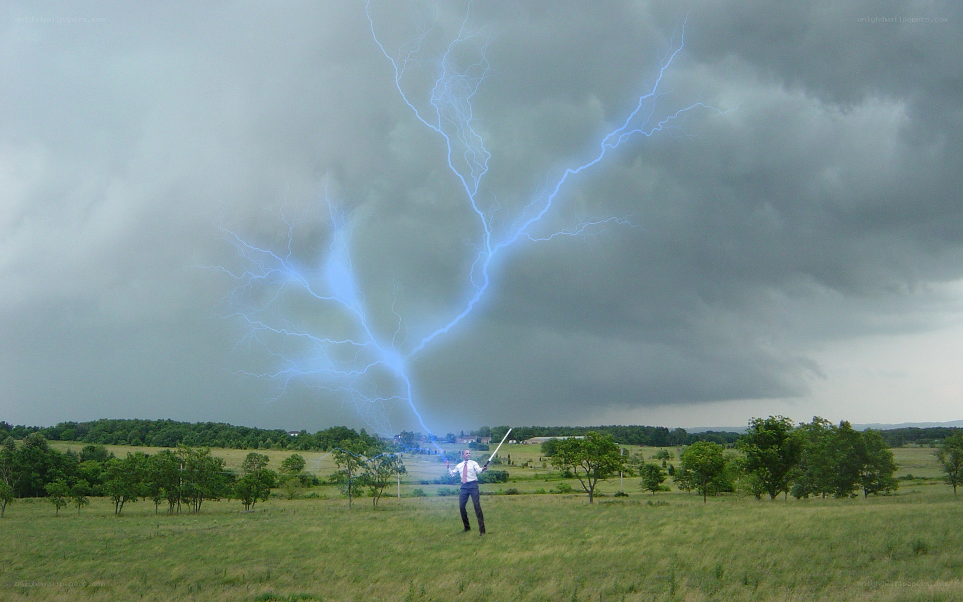 Man wielding lightning in field