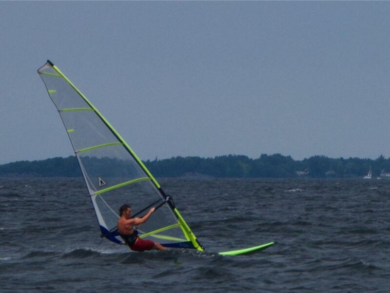 Man Windsurfing on Water