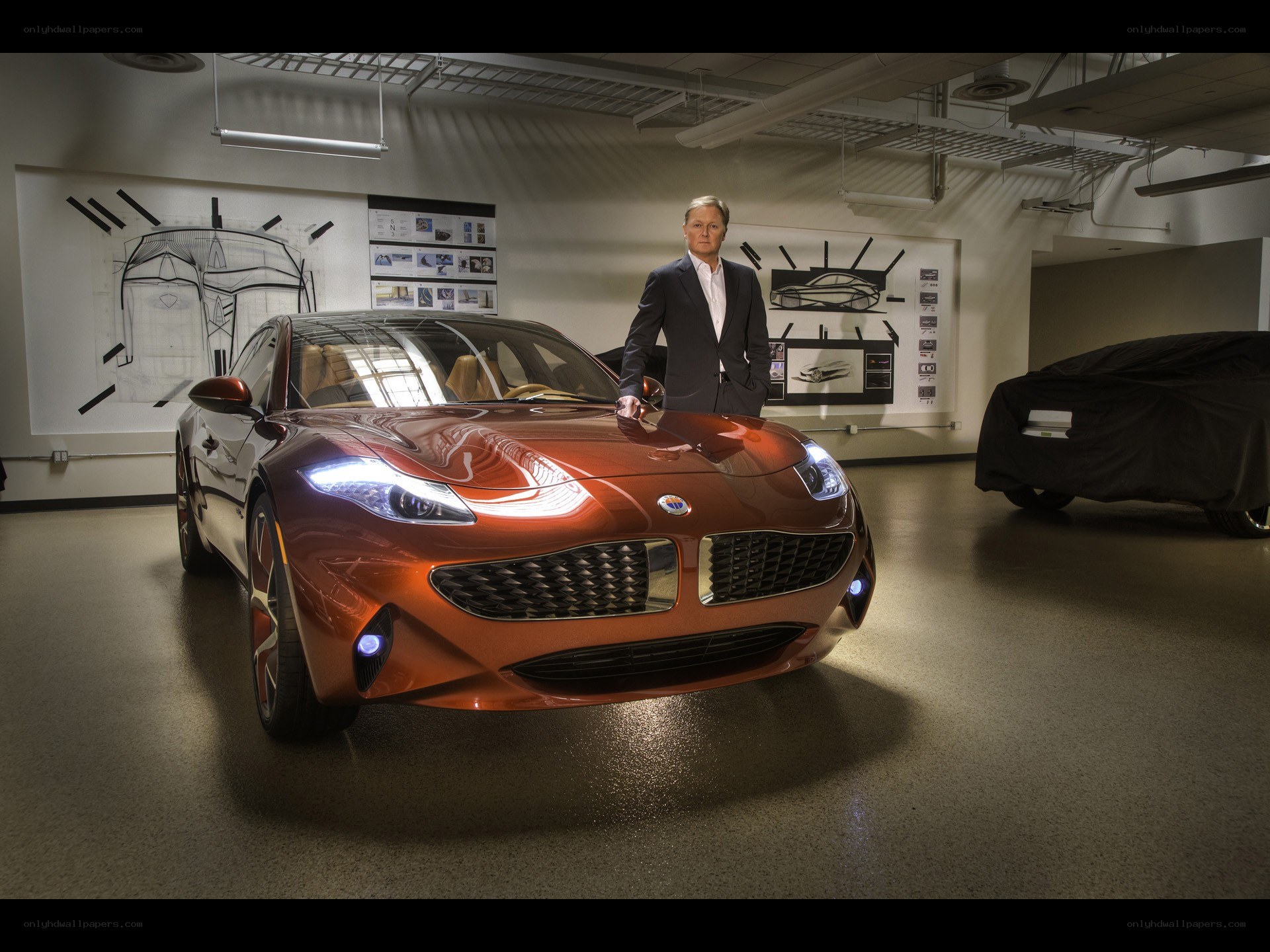 Man with a concept car