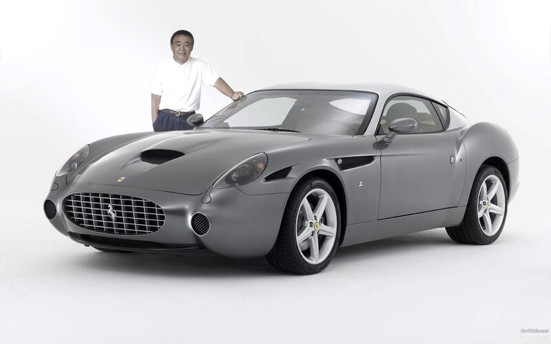 Man with a silver Ferrari