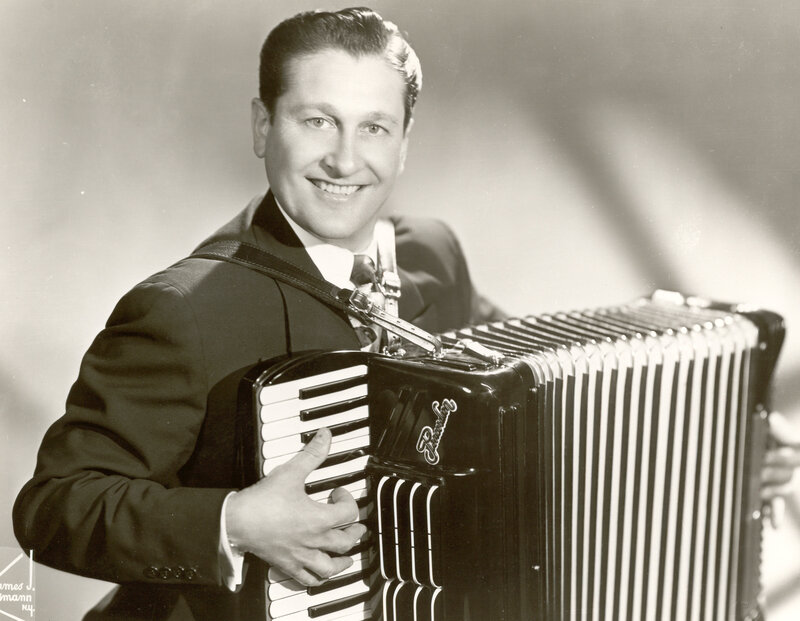 Man with accordion in suit