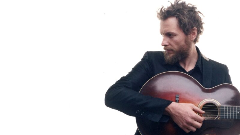 Man with Acoustic Guitar — White, Contemplative