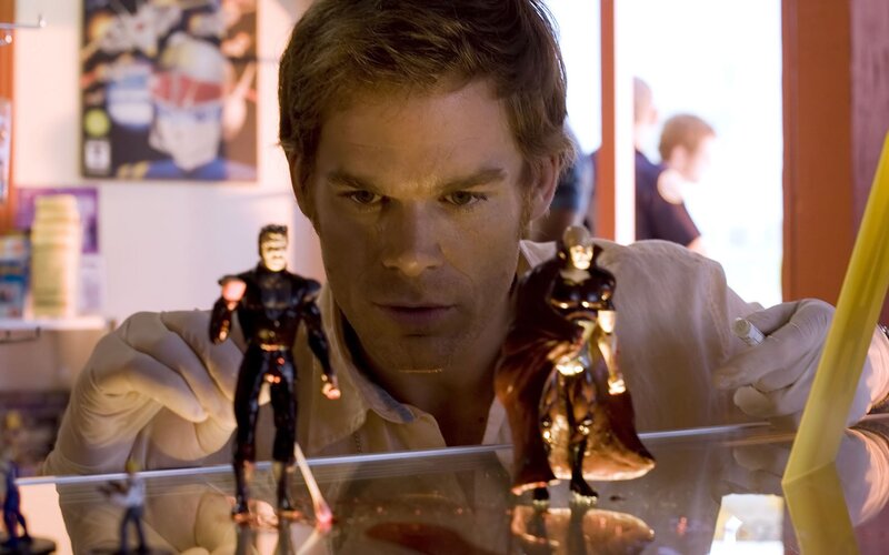 man with action figures