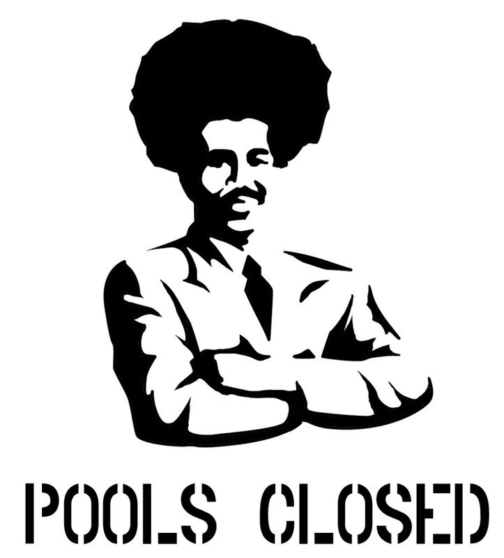 Man with afro and crossed arms