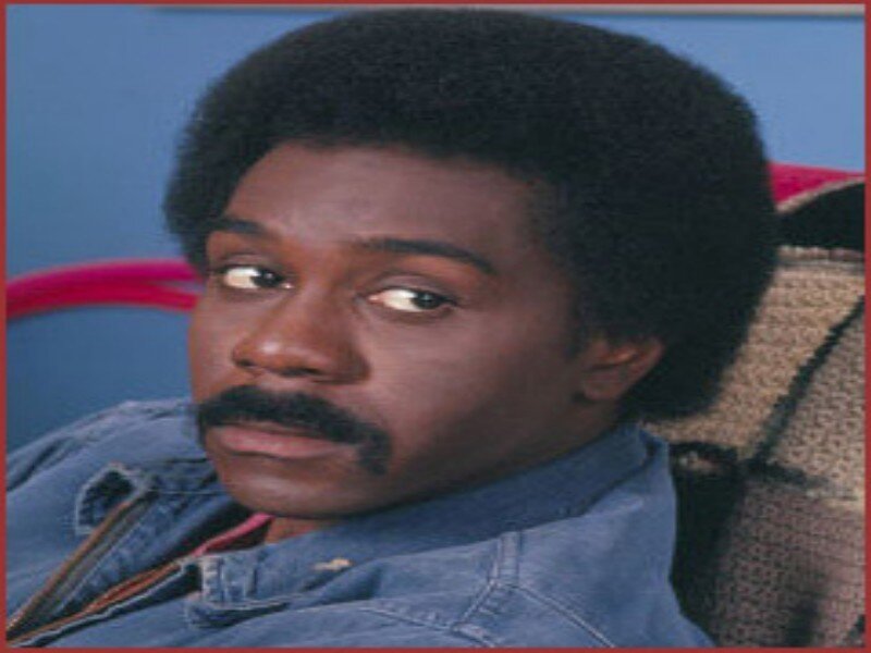 Man with Afro and Mustache