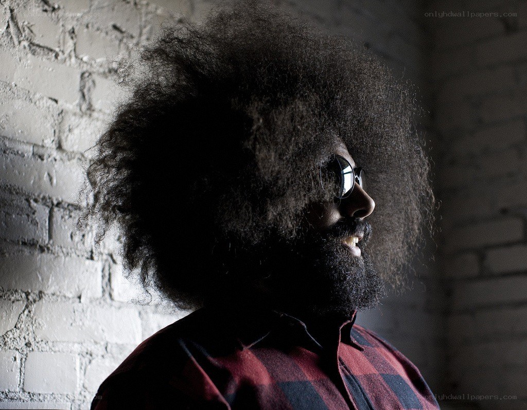 man with afro and sunglasses