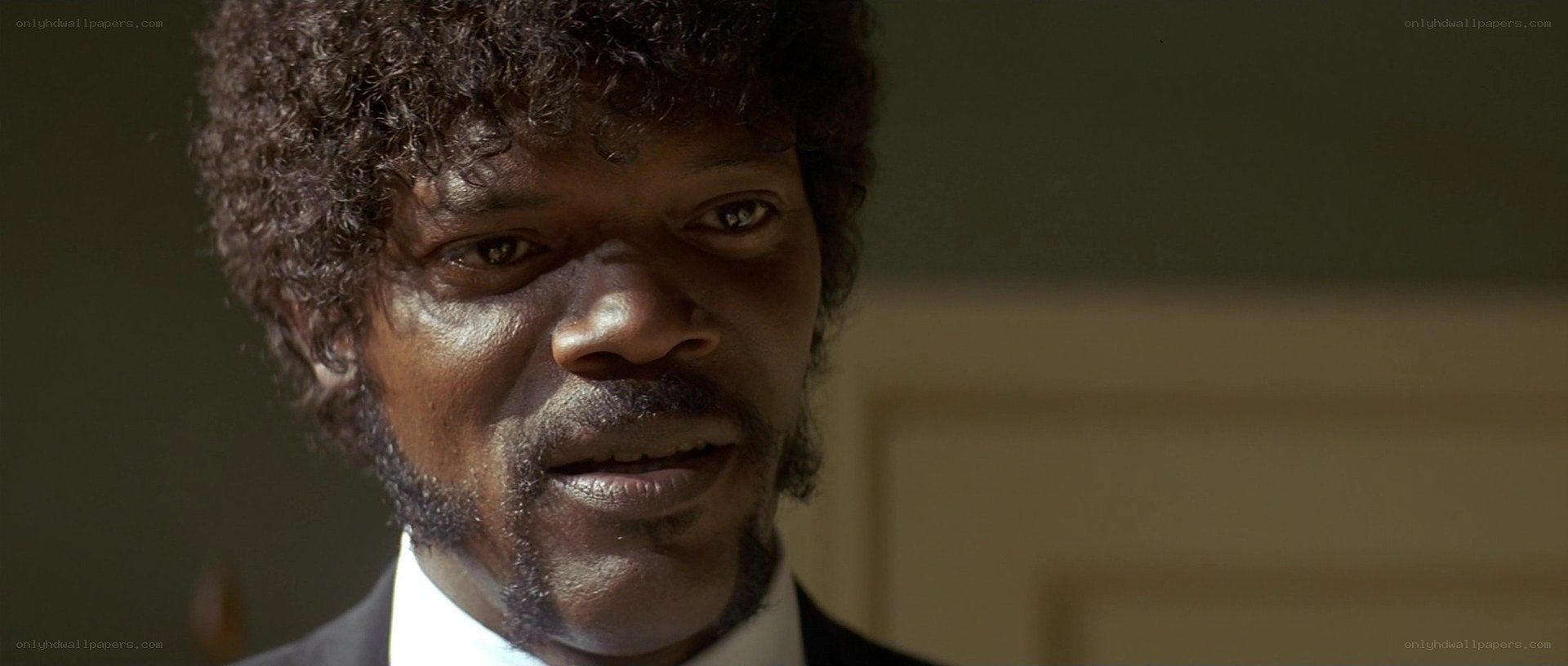 man with afro in suit