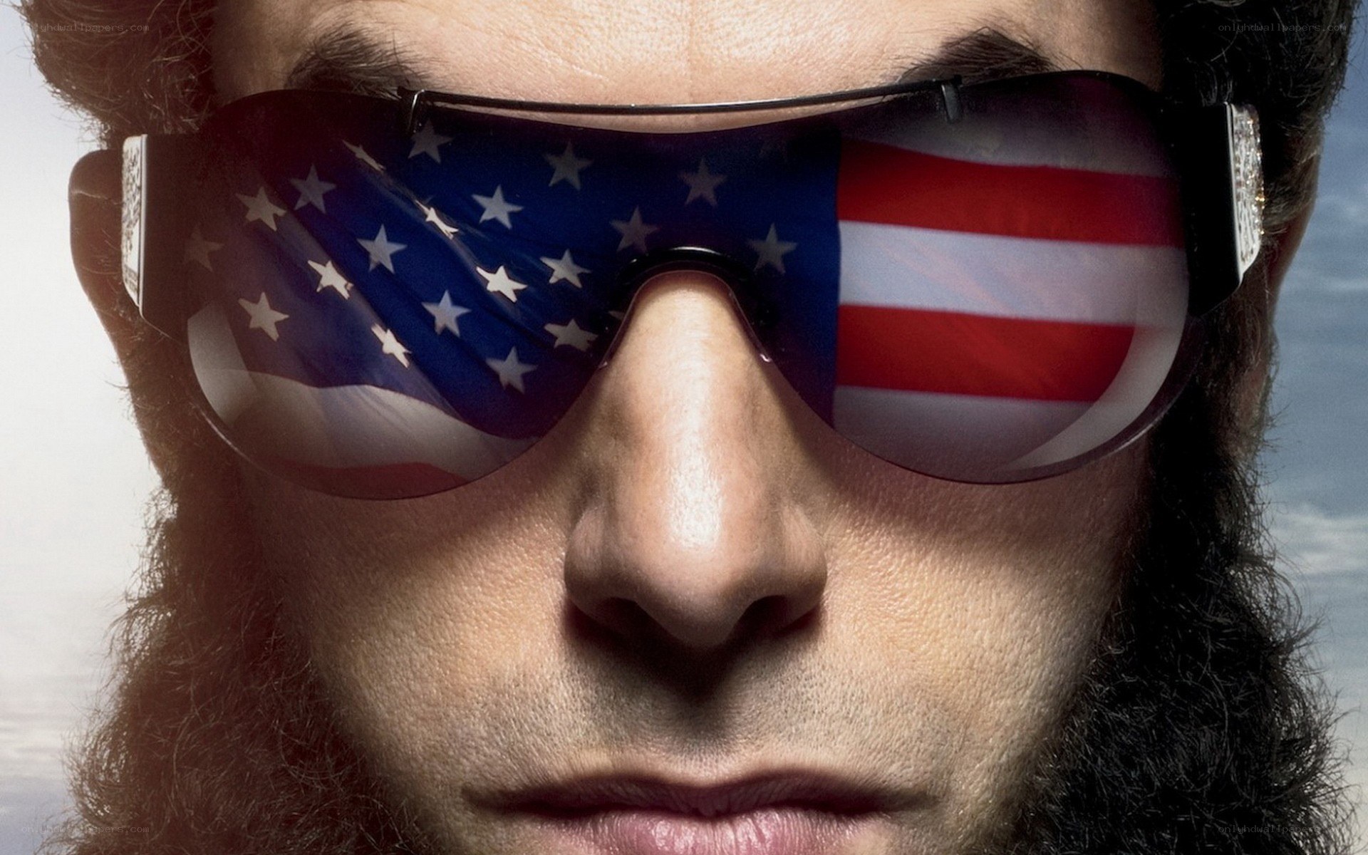 man with american flag sunglasses
