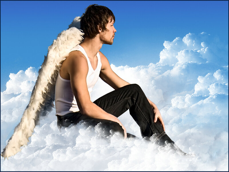 man with angel wings on cloud