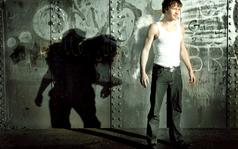 man with angel wings shadow