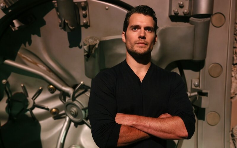 Man with Arms Crossed — Black, Serious, Photograph, Vault Door
