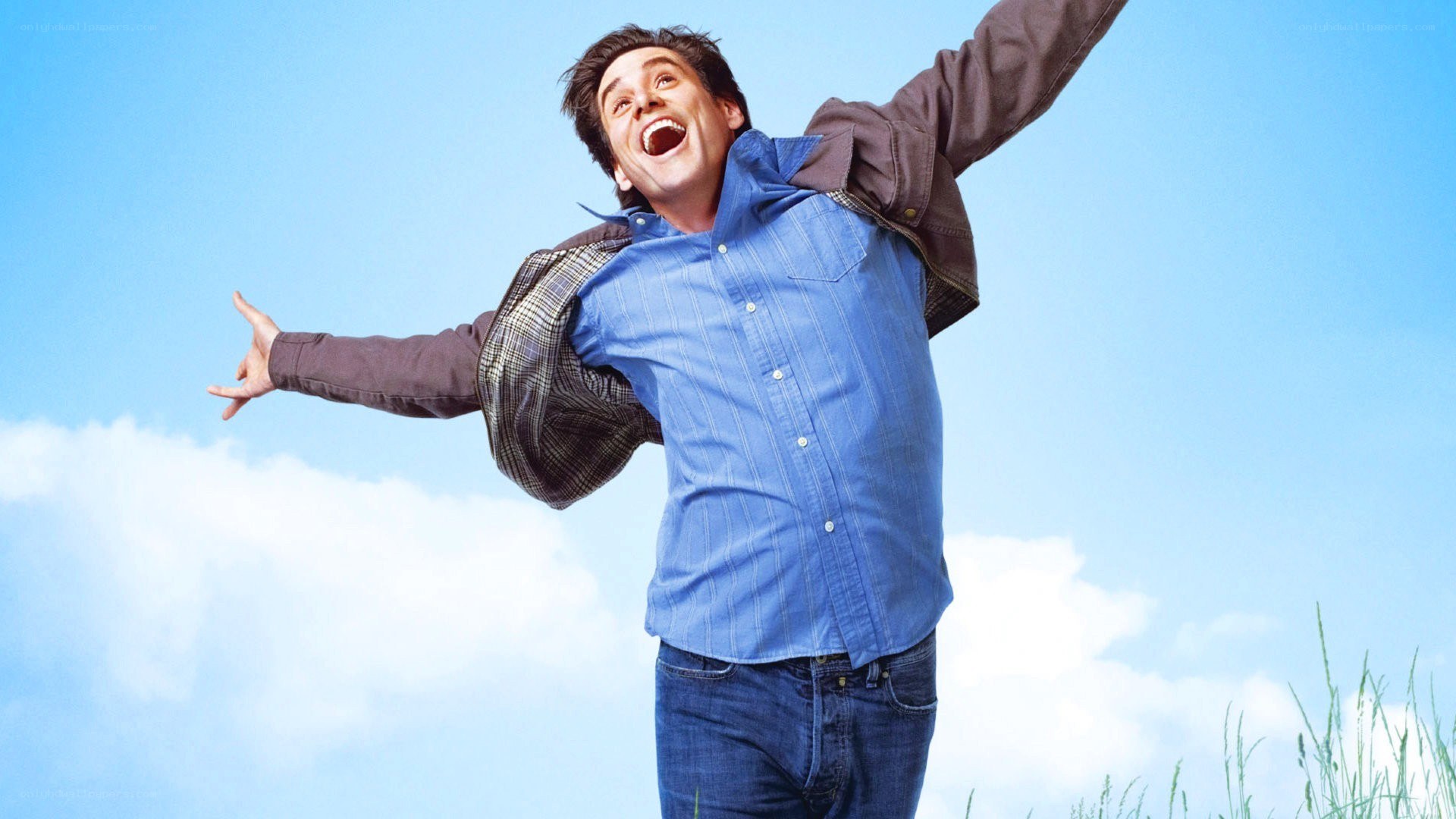 man with arms outstretched