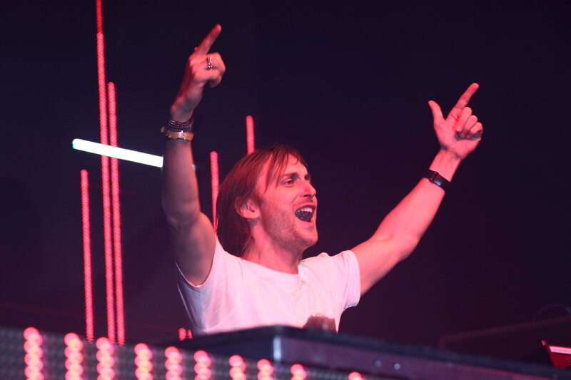 Man with Arms Raised — Red