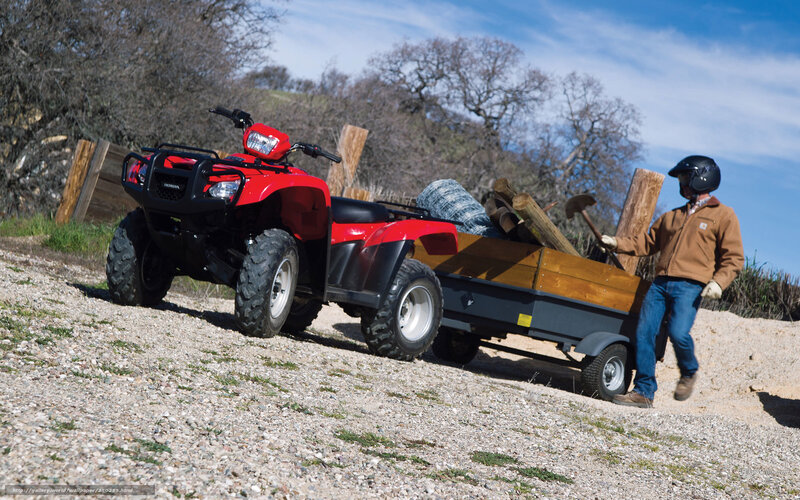 Man with ATV and trailer