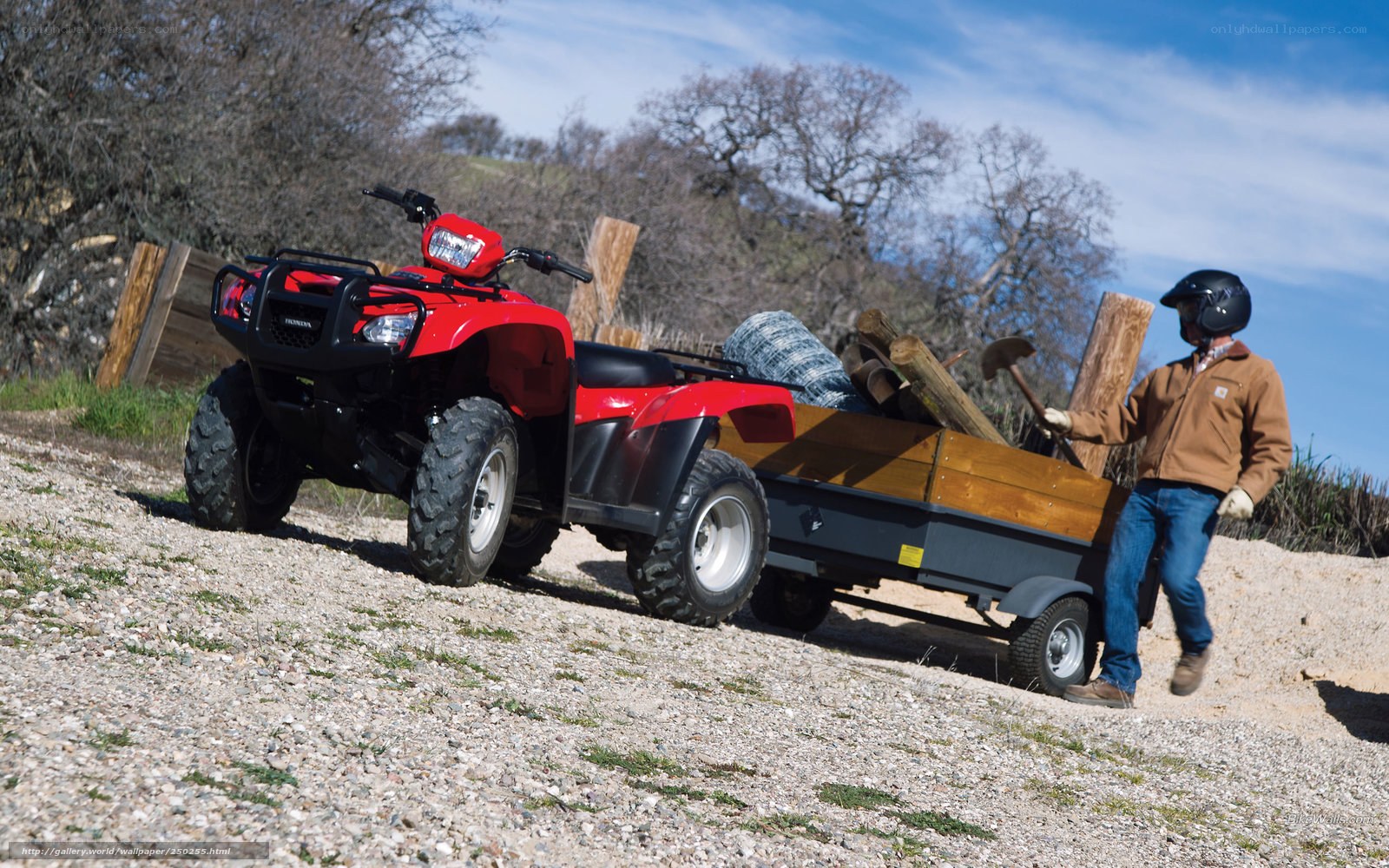 Man with ATV and trailer