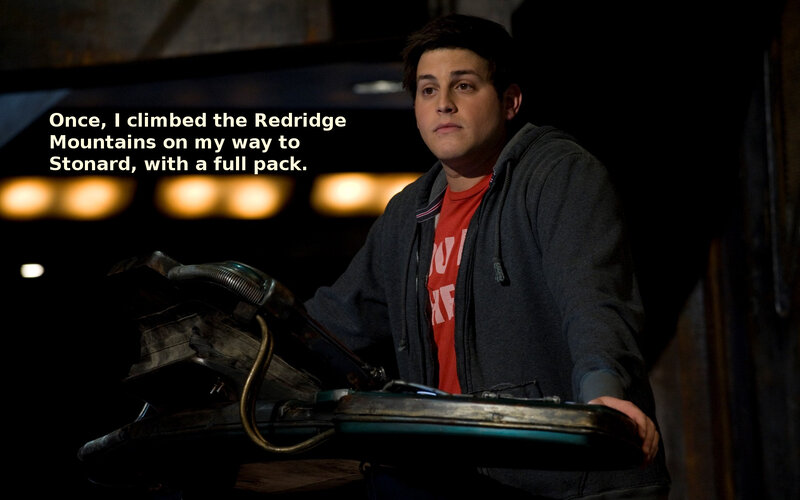man with backpack in dark room