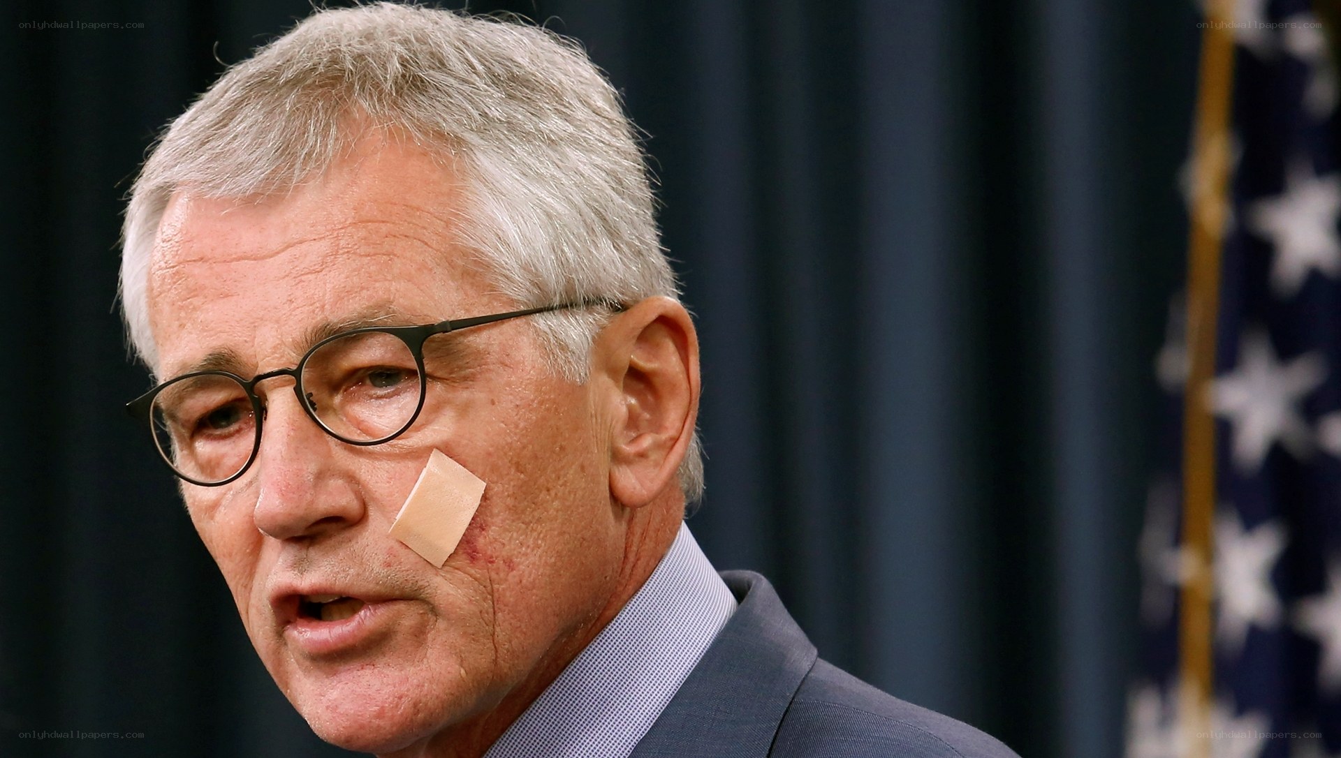 man with bandage on face