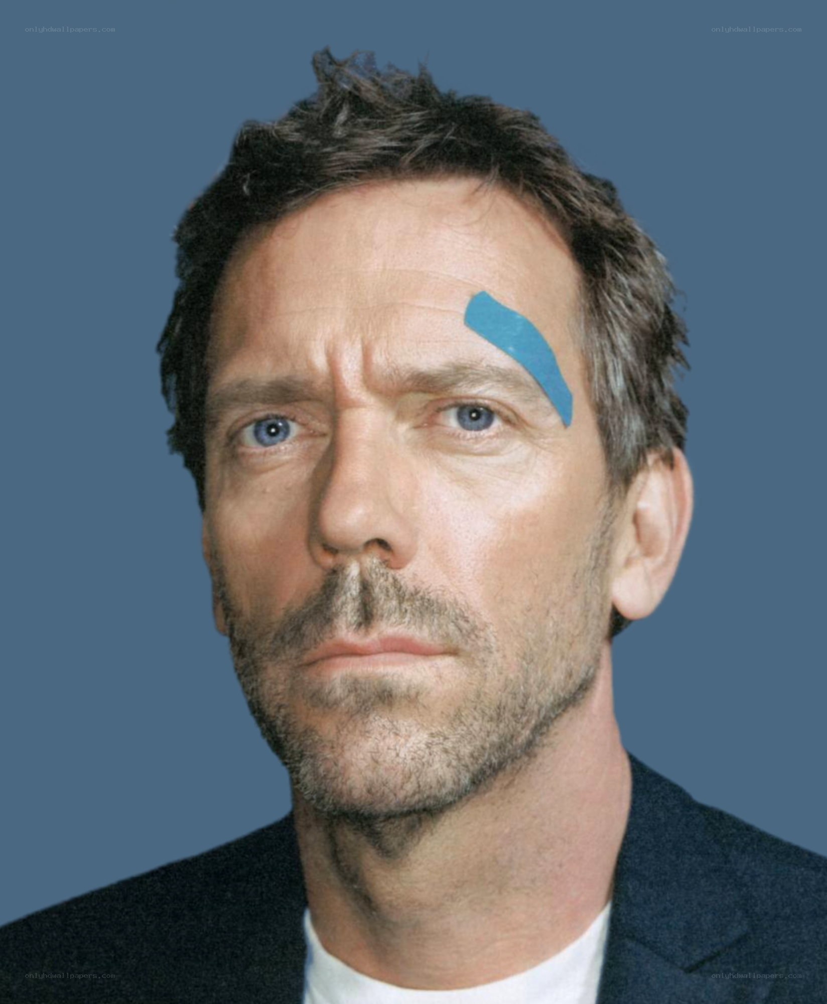 man with bandage on forehead